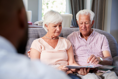 senior couple taking financial advice